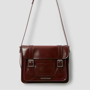 Dr. Martens 11 inch vegan leather messenger bag in cherry red